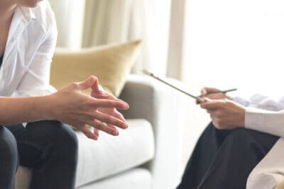 Patient in behavioral therapy and individual counseling for drug and alcohol addiction